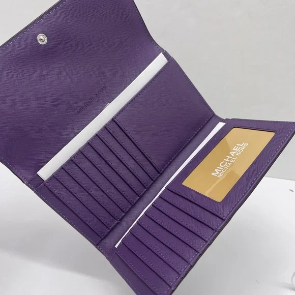 Michael Kors Lg Jet Set Travel Trifold Leather Wallet 
Dark Purple 
NWT - Picture 12 of 16
